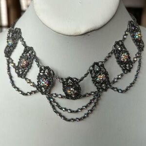 Necklace and a Kenny MA pin that can be worn necklace as well as a pin